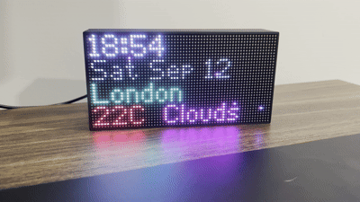 DataPix WiFi LED ticker panel showing time, date, city and weather conditions